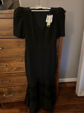 Xscape Black Maxi Dress with V-Neck and Puff Shoulders and Sheer Panels